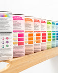 A selection of Tints of Nature bold hair dye colours displayed in a bathroom